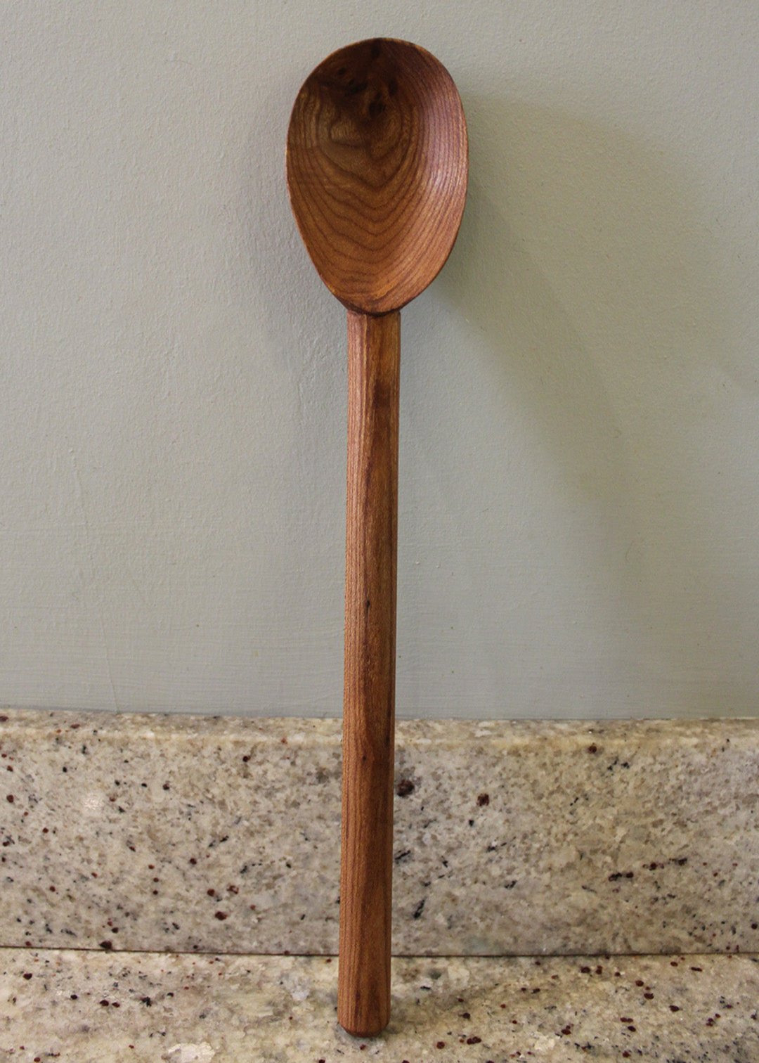 Big stirrer cooking spoon hand carved from Elm, in Fife. Scottish Textiles Showcase.