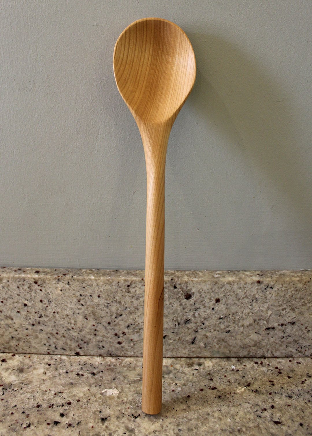 Big stirrer cooking spoon hand carved from Cherry, in Fife. Scottish Textiles Showcase.