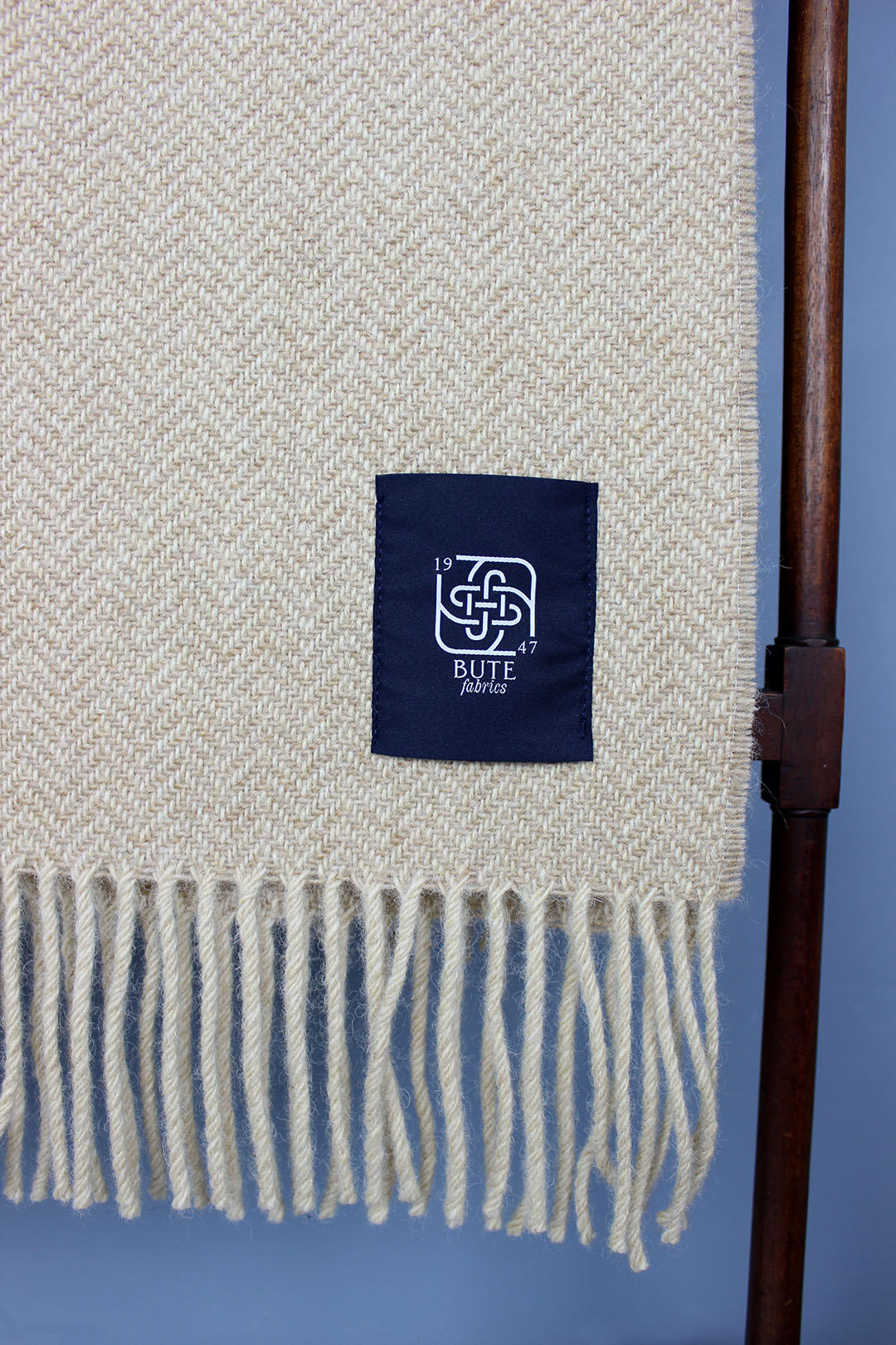 Wool chevron throw in oatmeal colourway.