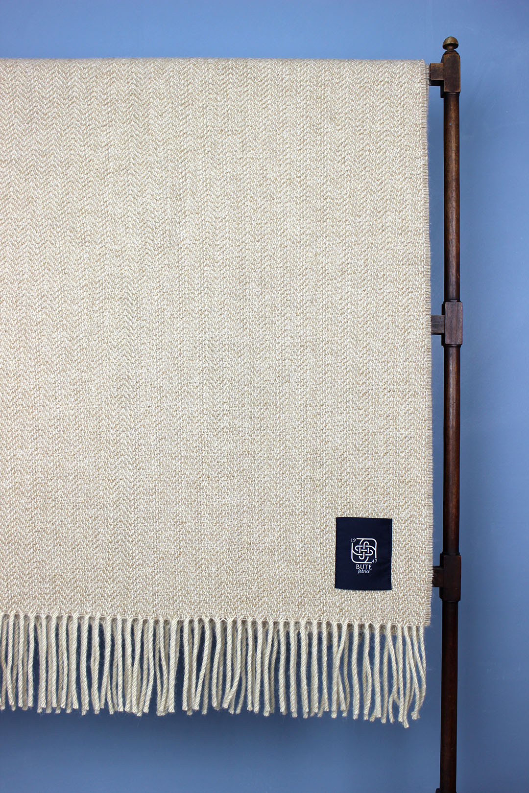 Wool chevron throw in oatmeal colourway.
