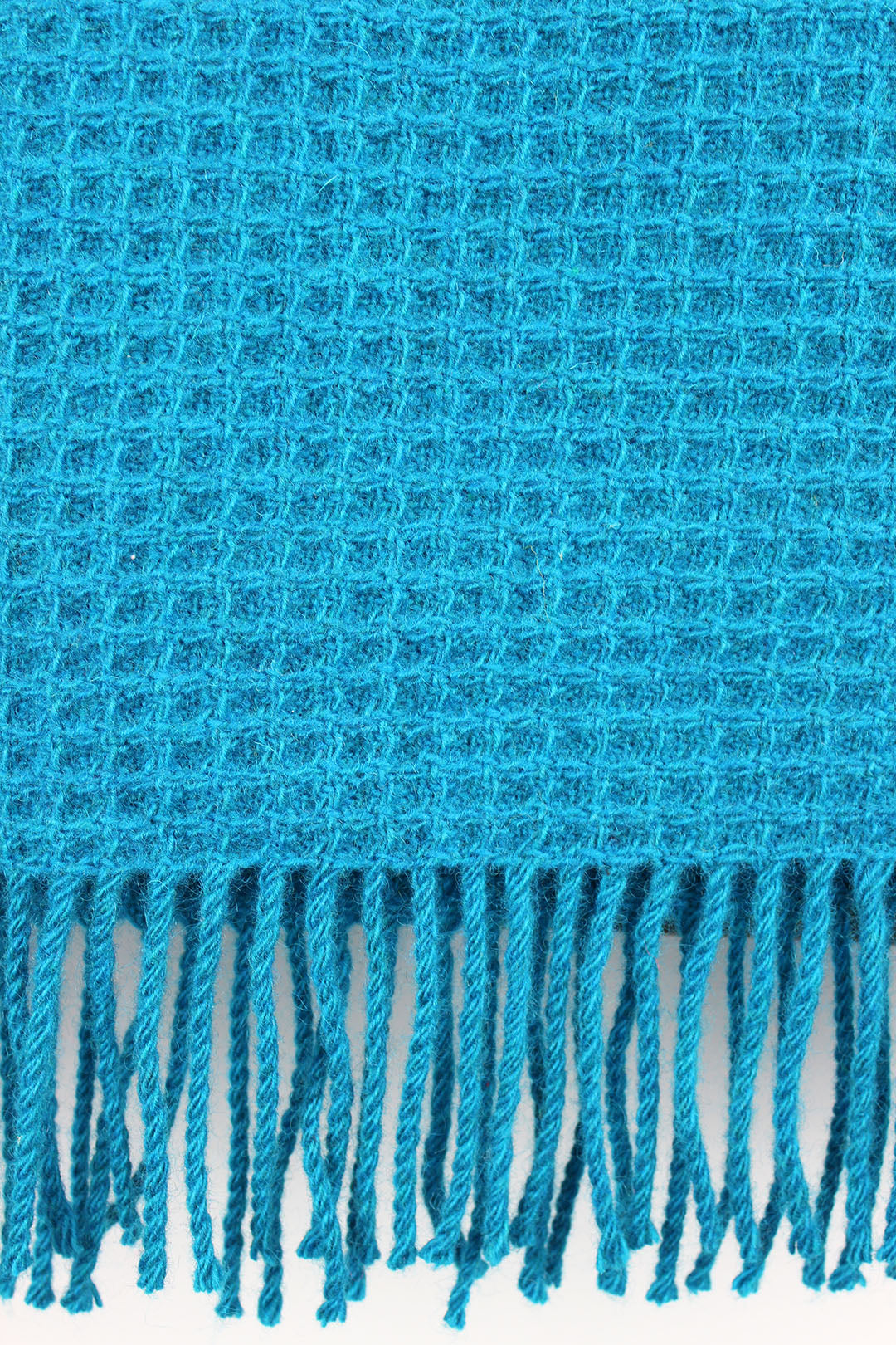 Bute waffle throw in Turquoise