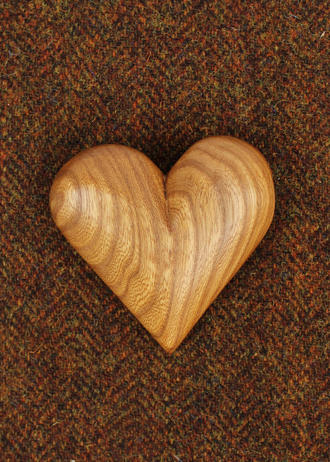 Hand carved wooden heart in Elm.