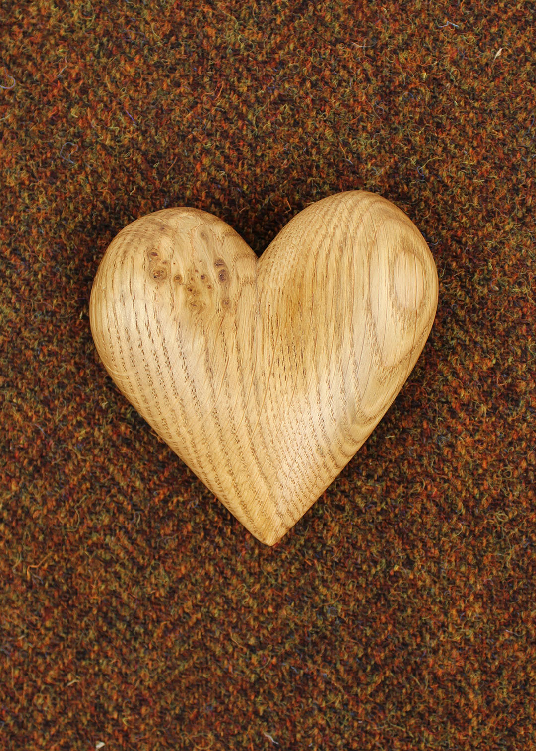 Hand carved wooden heart in Oak.