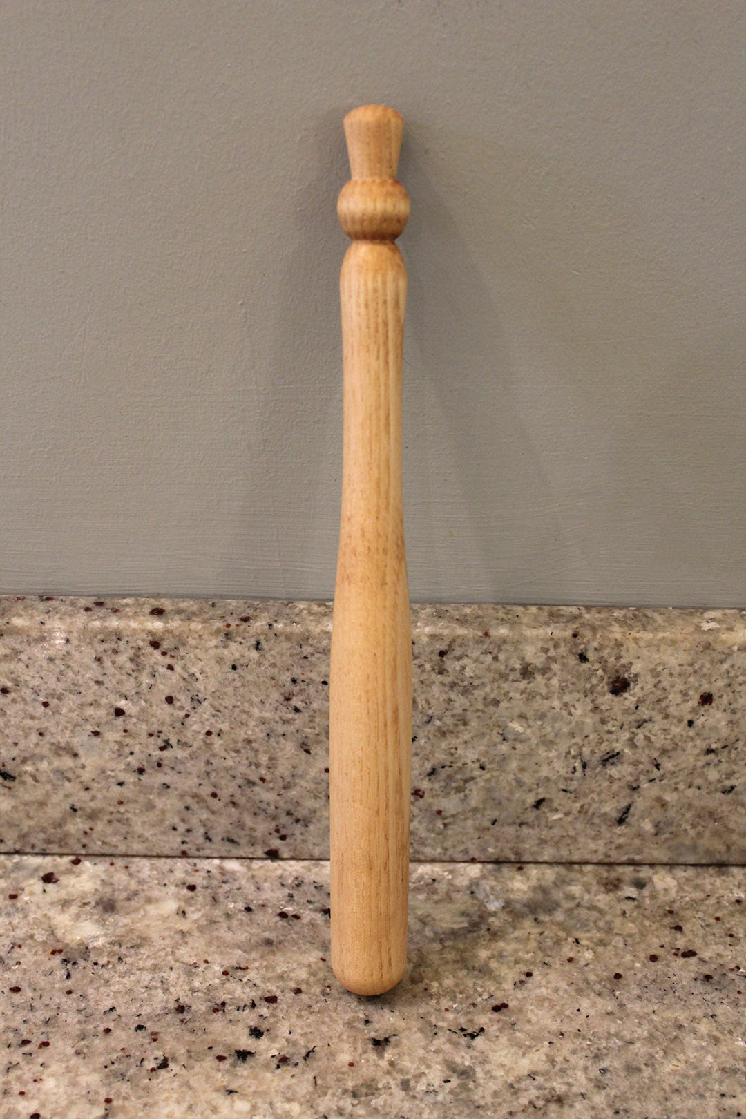 Porridge spurtle carved from ash. Scottish Textiles Showcase.