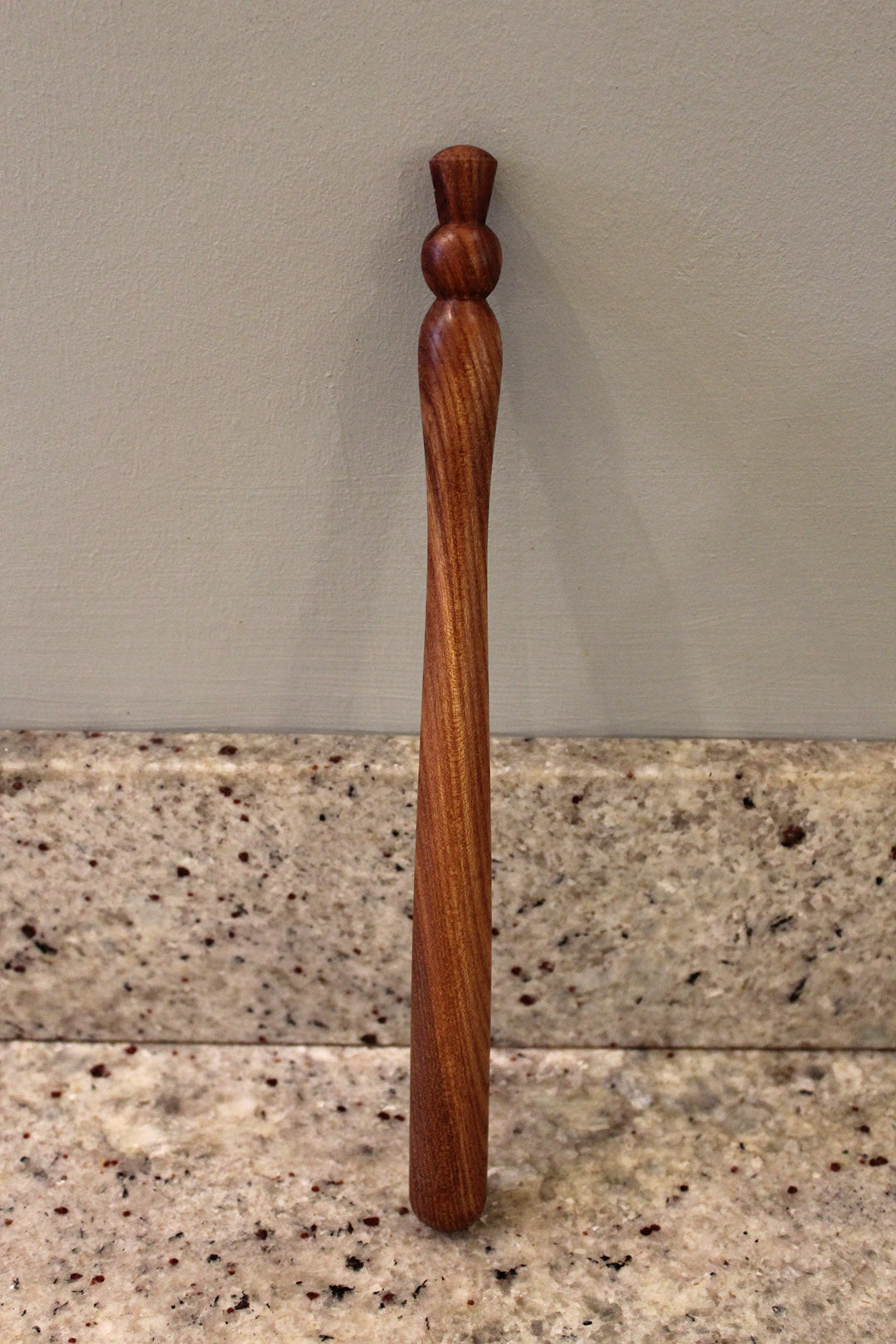 Porridge spurtle carved from Elm. Scottish Textiles Showcase.