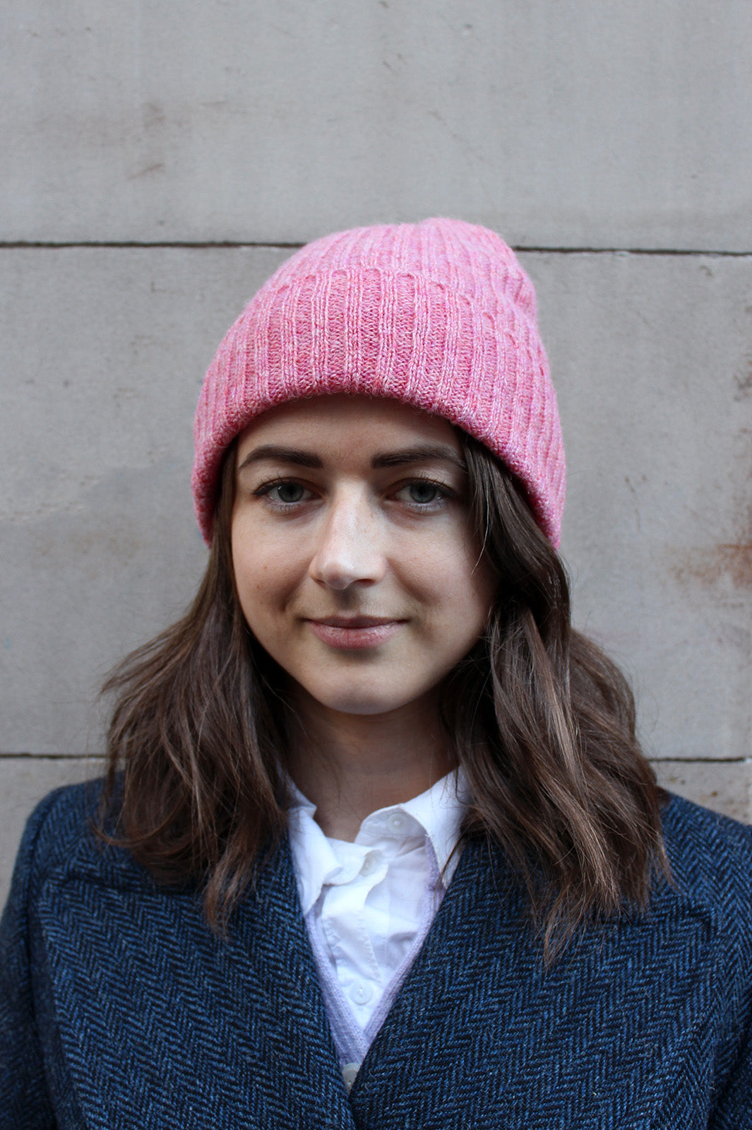 Knitted hat in pink British Wool. Scottish Textiles Showcase.