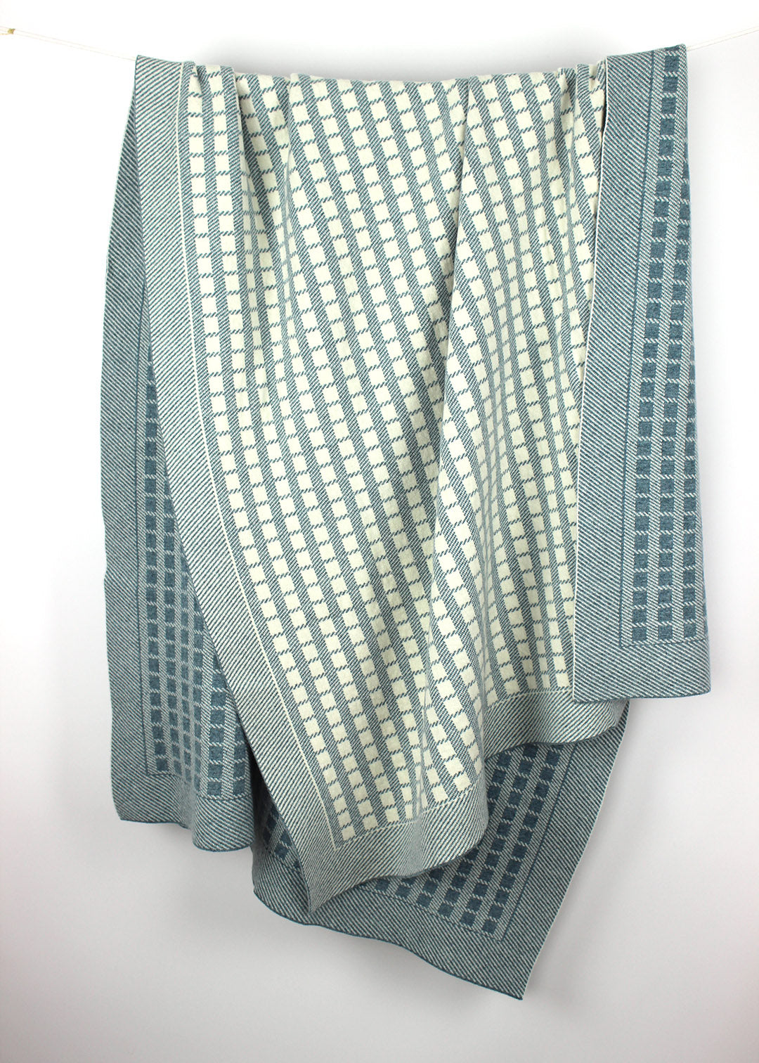 Blue oribe squares lambswool blanket.