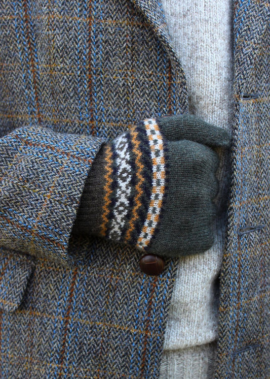 Fairisle mens gloves shown on model. Scottish Textiles Showcase.