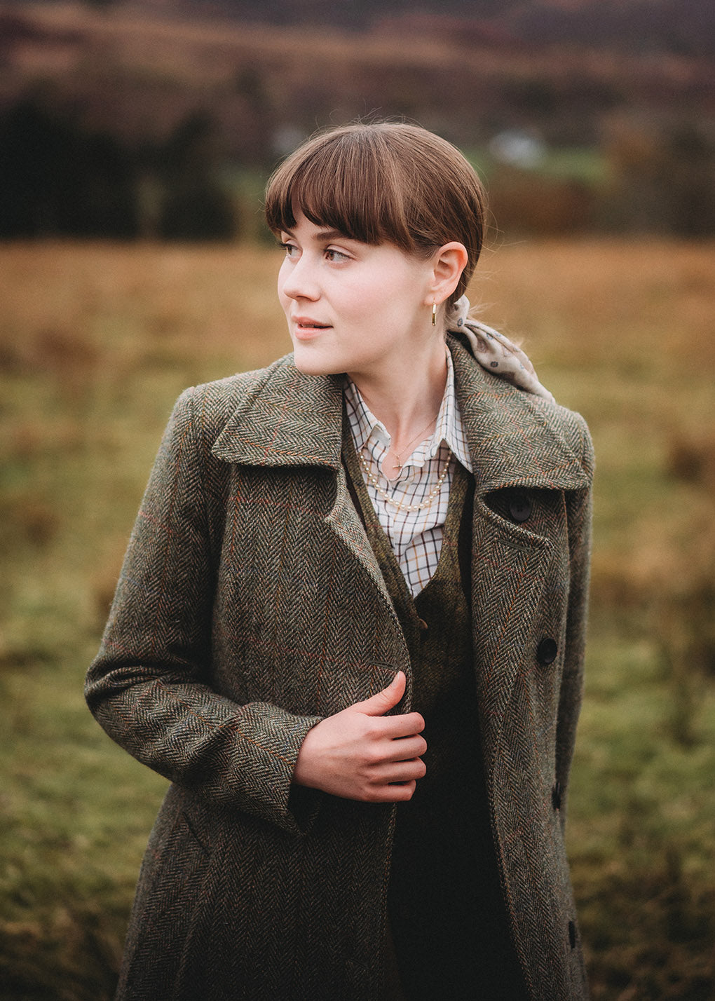 Harris Tweed Marta coat photographed in Glencoe. Scottish Textiles Showcase.