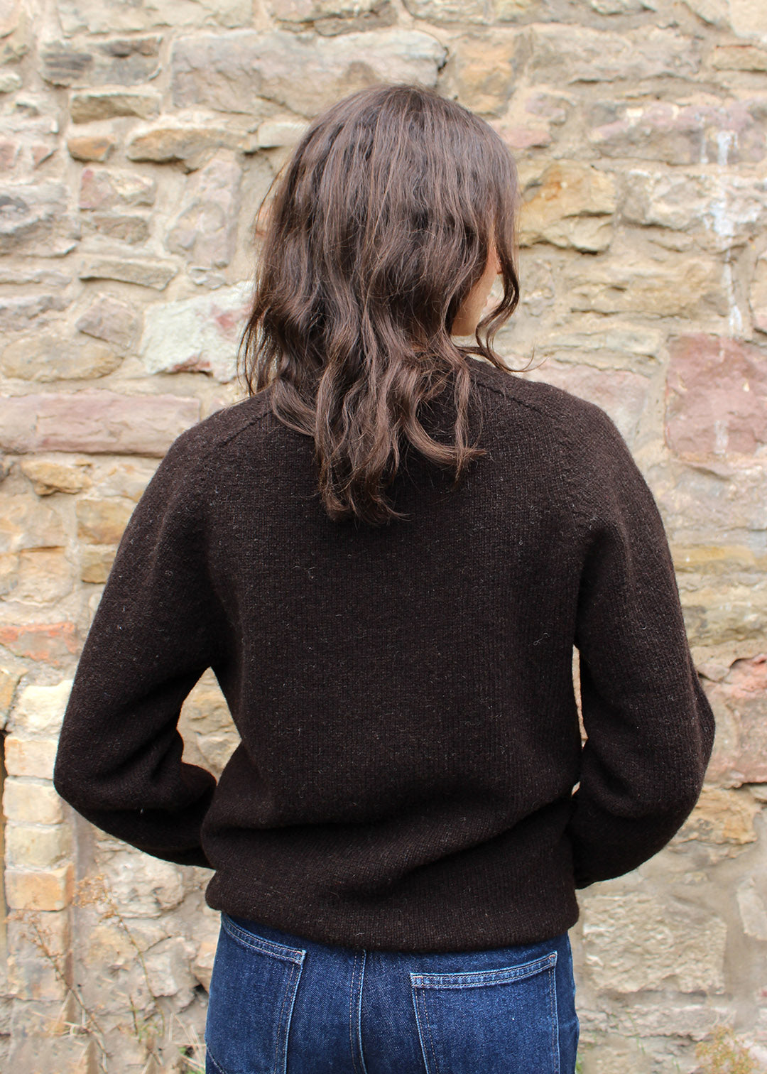 Shetland black jumper detail shown on model.