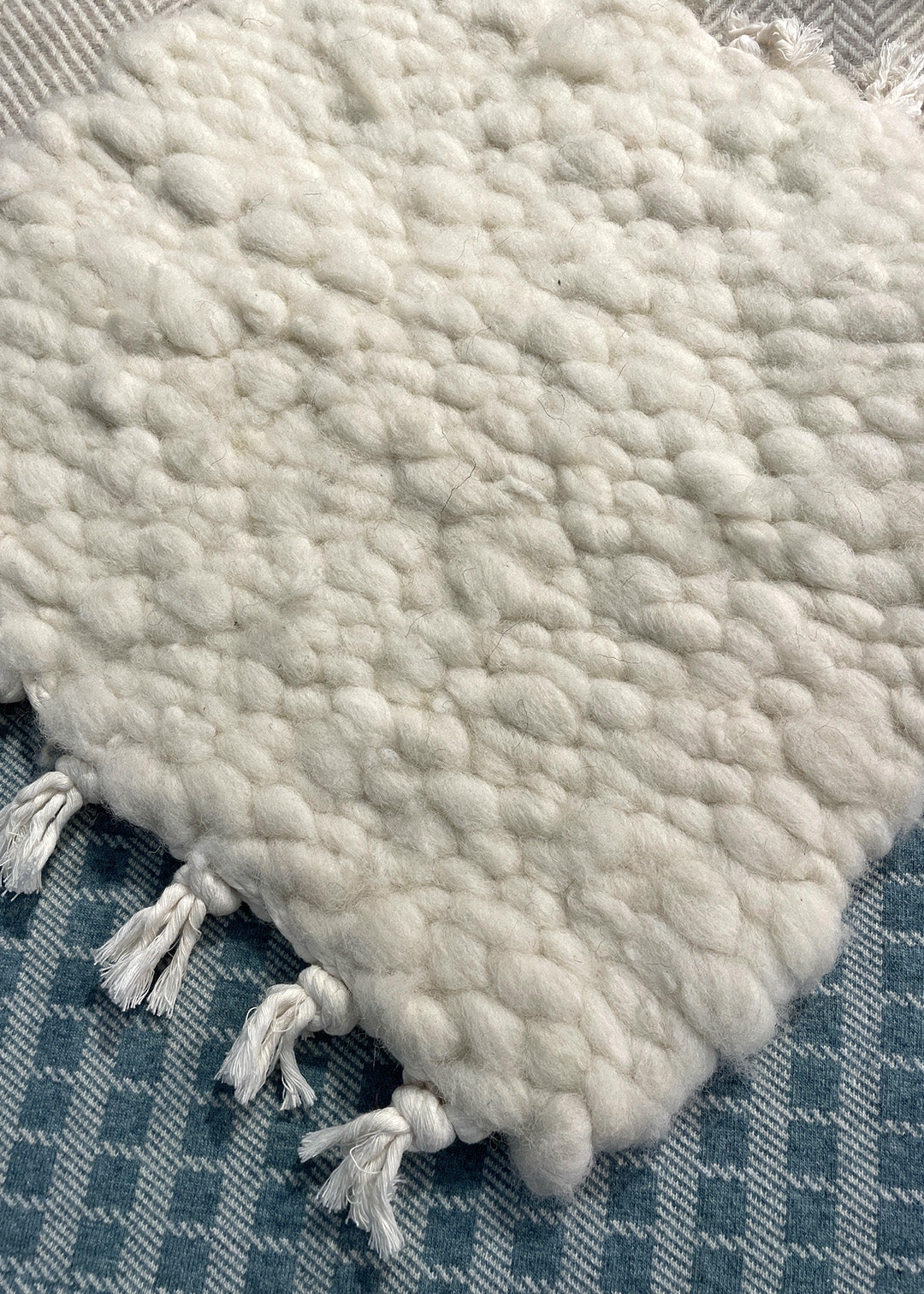 Hand woven fleece rug in cheviot sheep's wool.