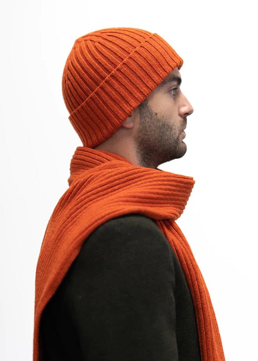 Ribbed knit beanie hat in deep orange Furnace colour. Scottish Textiles Showcase.