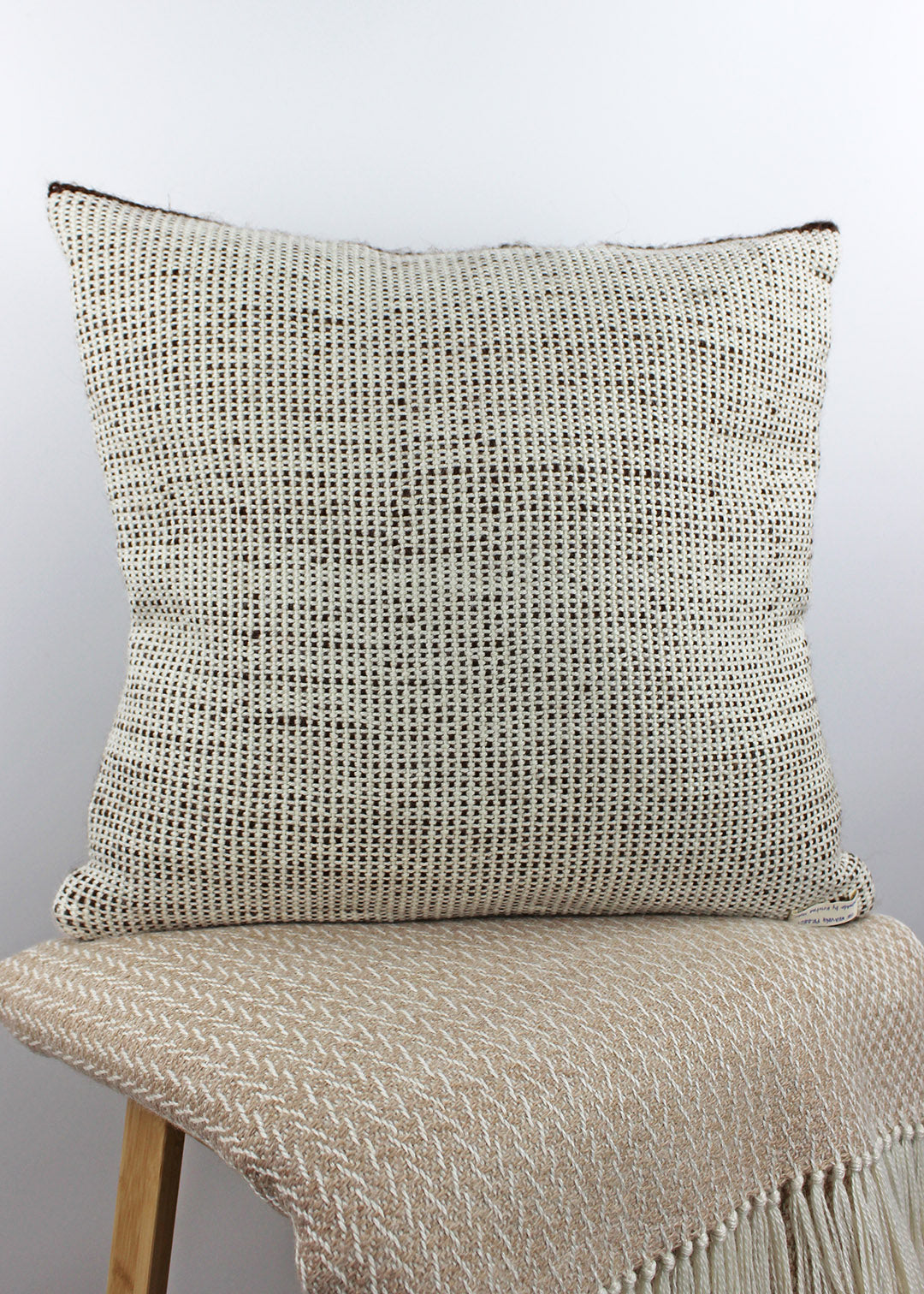 Limited edition, handwoven alpaca cushion in natural, un-dyed cream and brown. Made in Edinburgh by spinner, dyer and weaver Kristina Taylor.