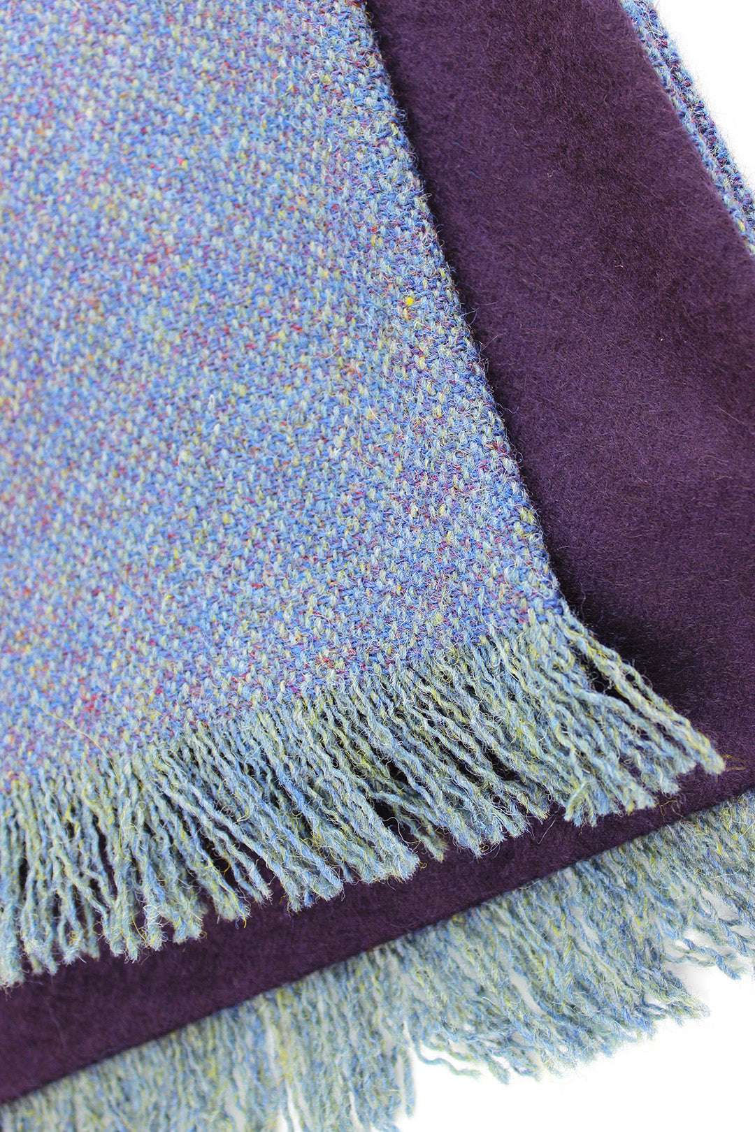 Harris tweed scarf in blue hues with purple cashmere lining