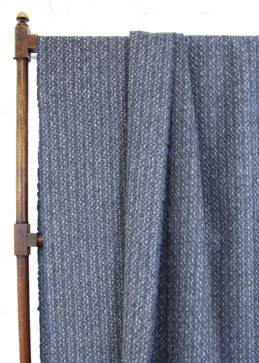 Pure cashmere throw in a subtle mottled slate blue-grey.