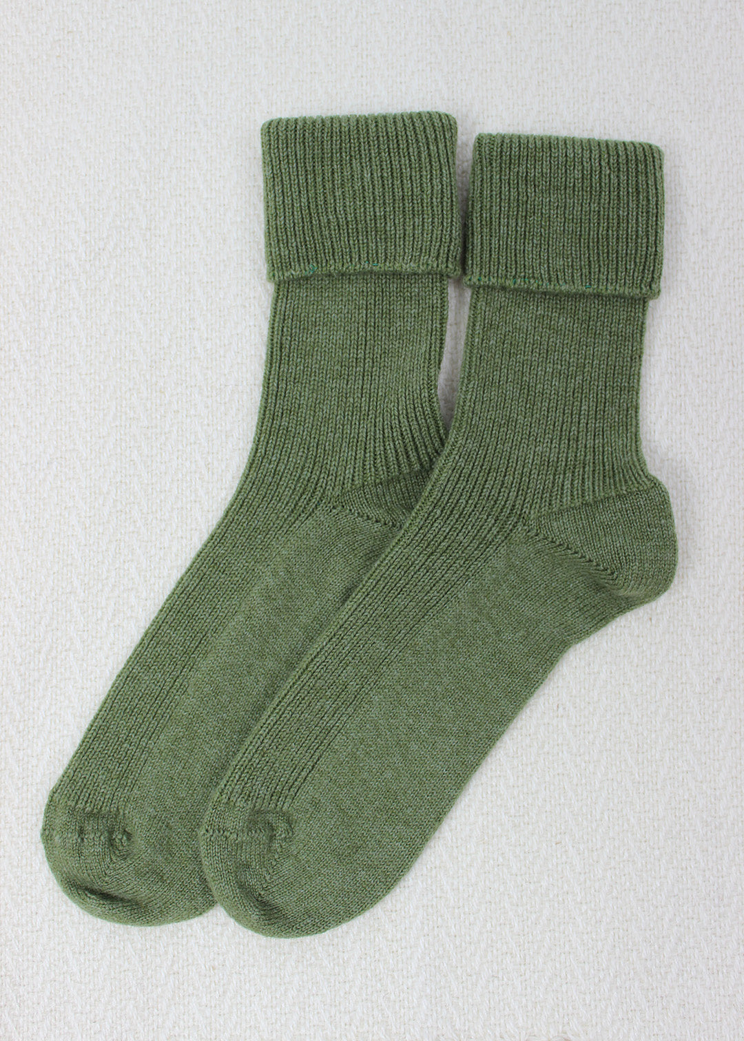 Cashmere bed socks in ivy green.