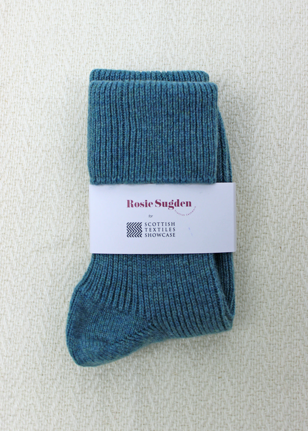 Cashmere bed socks in sea blue.