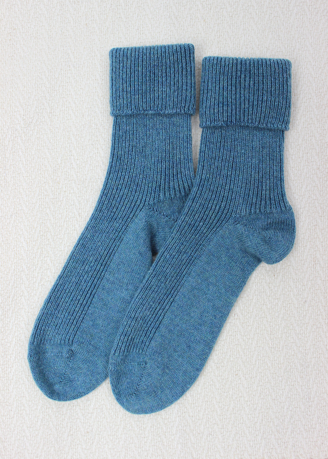 Cashmere bed socks in sea blue.