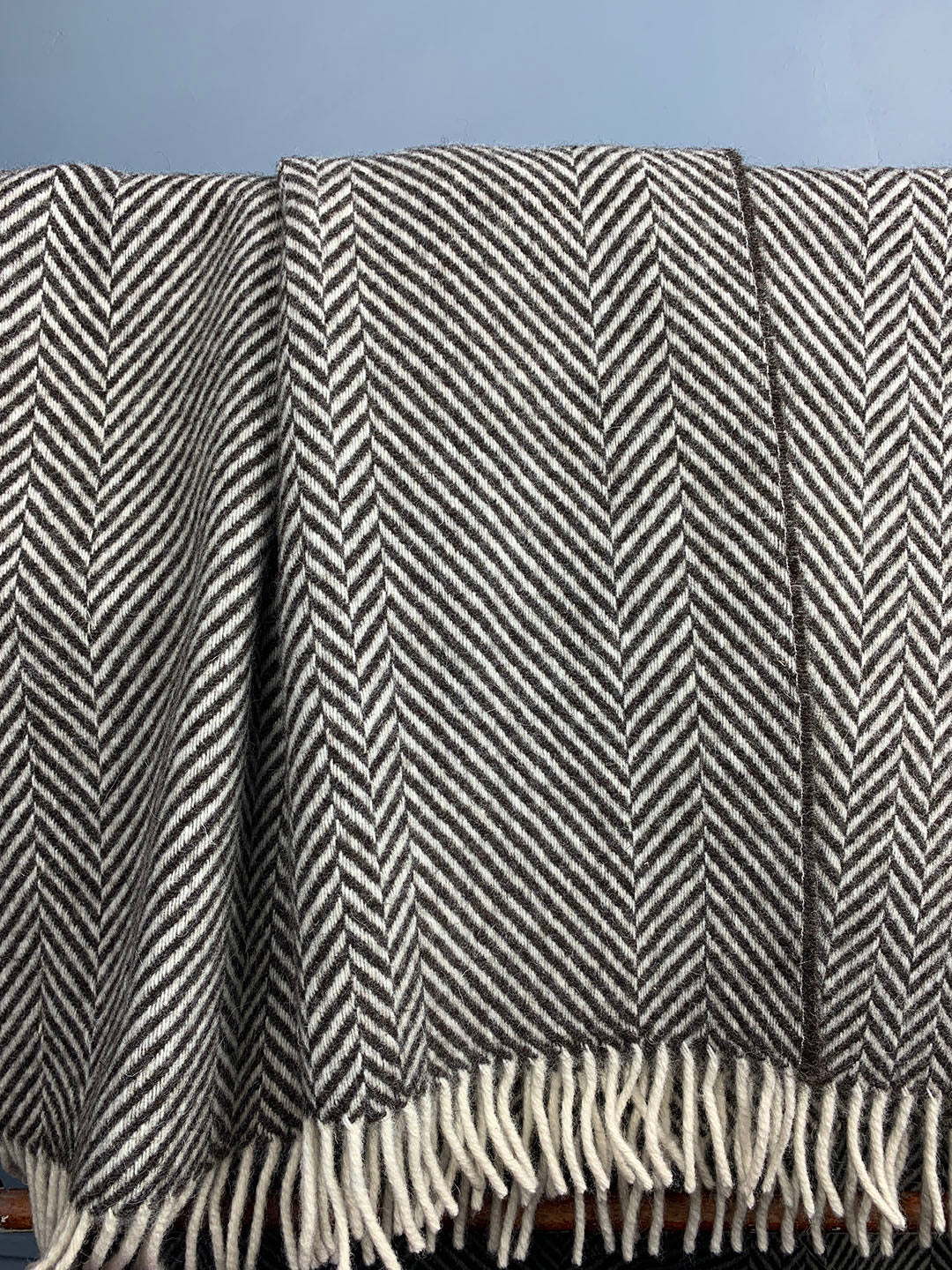Brown blanket with tassels and geometric pattern from Jacob wool