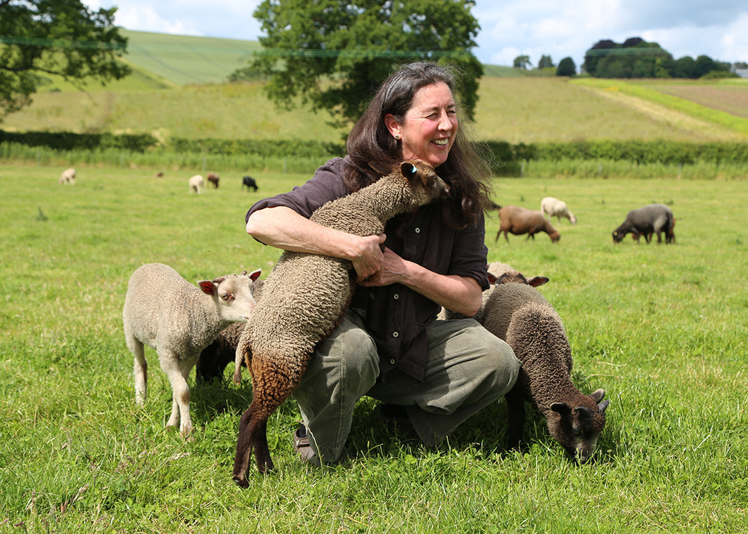 Designer and shepherdess Lindsay Girvan with her flock of Shetland sheep.