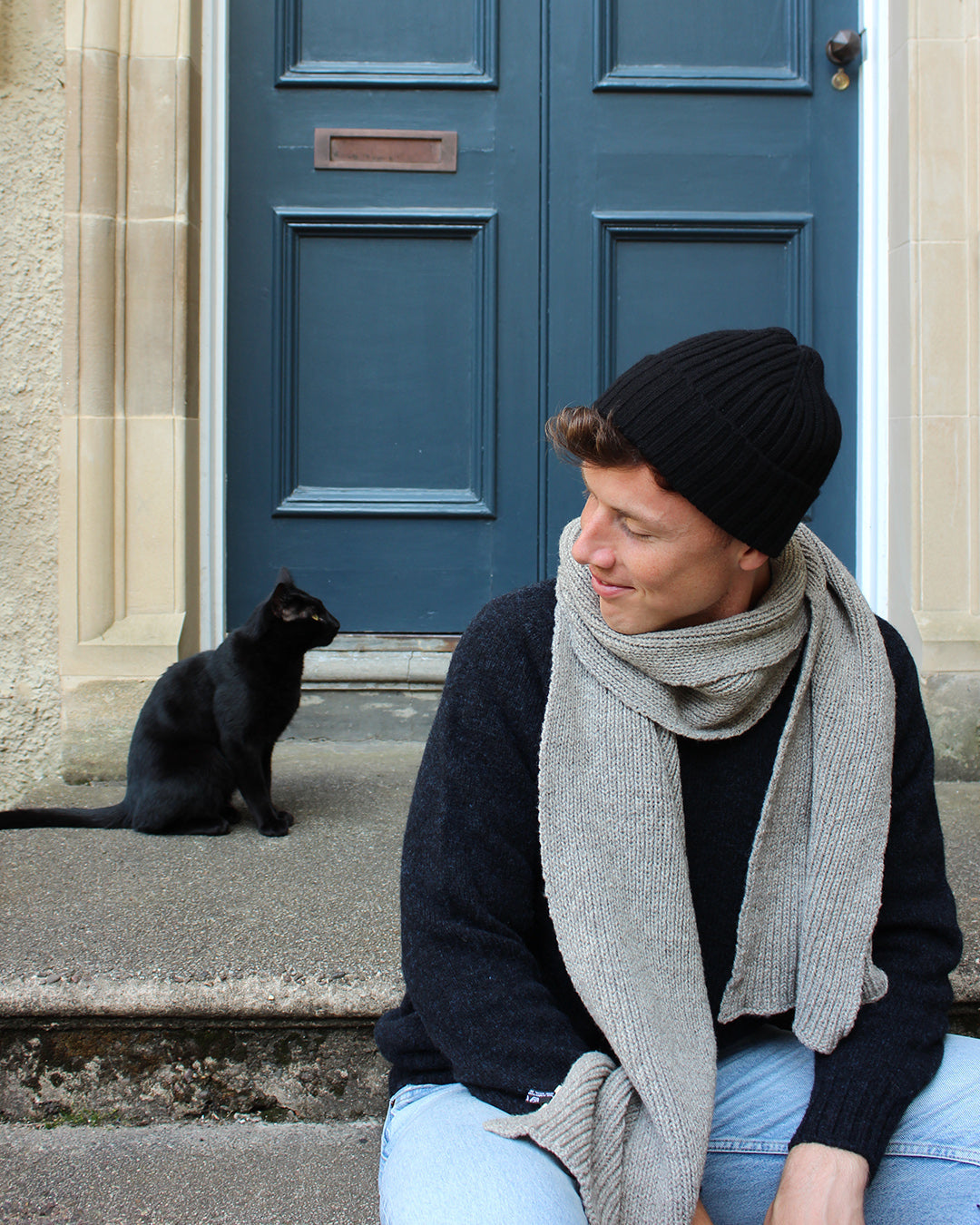 Cashmere beanie in white, Harris Tweed ladies coat in brown. 