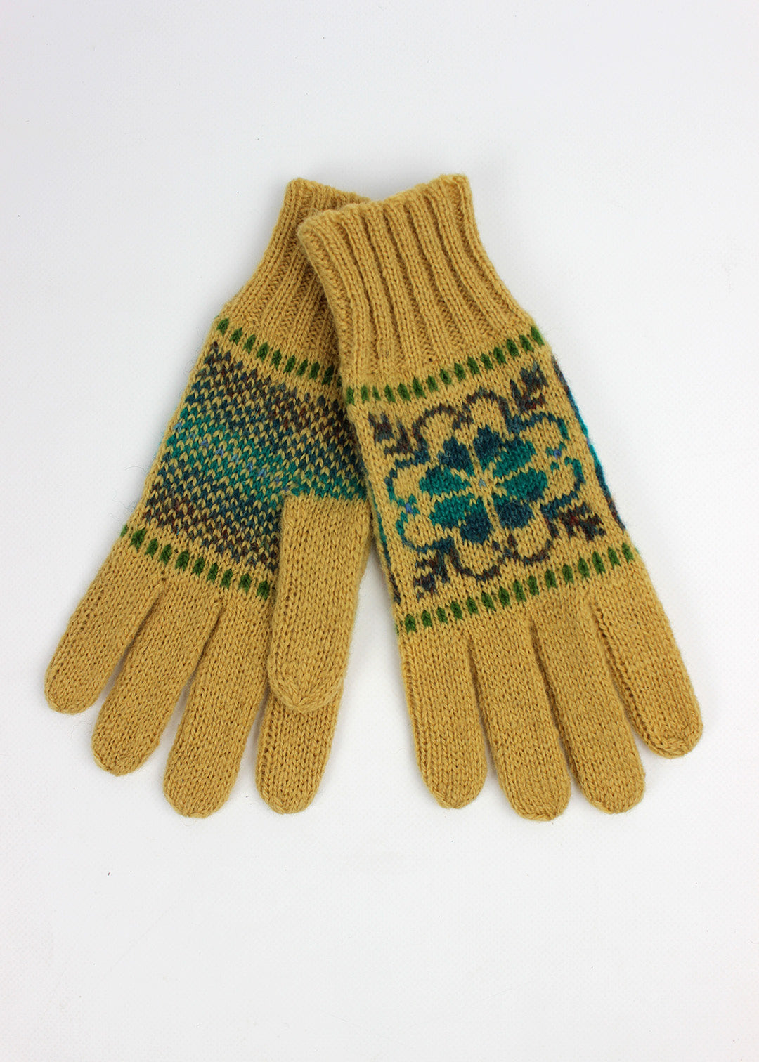 Hand knitted Fair Isle gloves in ochre with colourful details, made exclusively for the Scottish Textiles Showcase.
