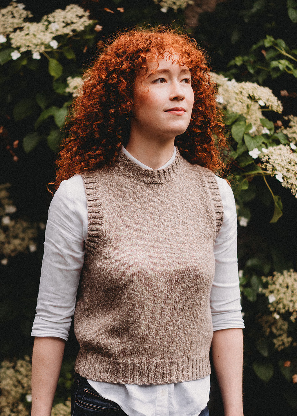 Fawn and white marl vest knitted in the softest lambswool.