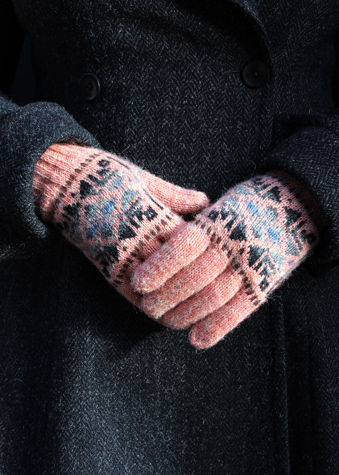 fair isle gloves in pink colour knitted in shetland