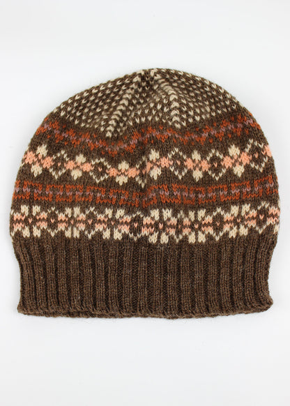 Hand knitted Fair Isle beanie hat in brown with contrasting details.