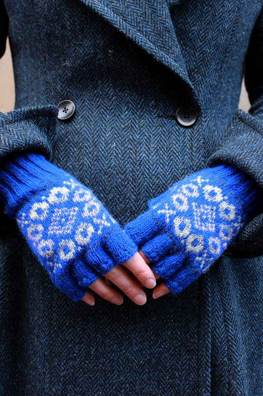 Hand knitted Fair Isle fingerless gloves in shades of blue, made exclusively for Scottish Textiles Showcase.. 