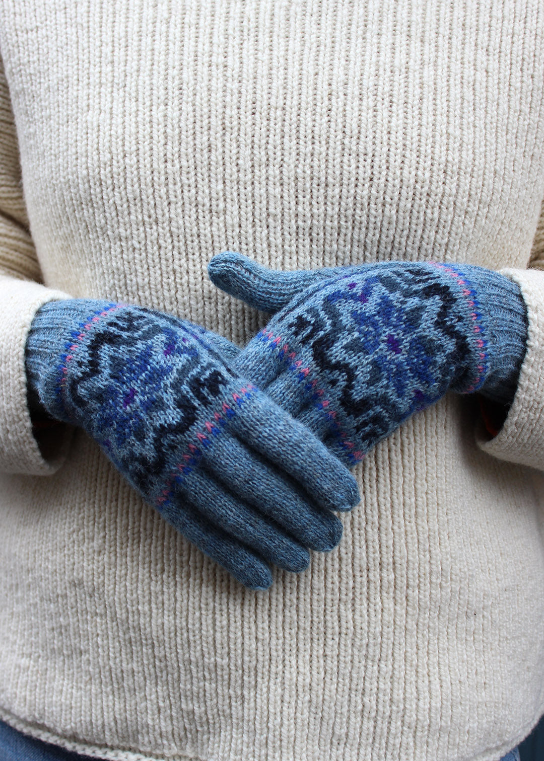 Pair of blue Fair Isle knitted gloves.