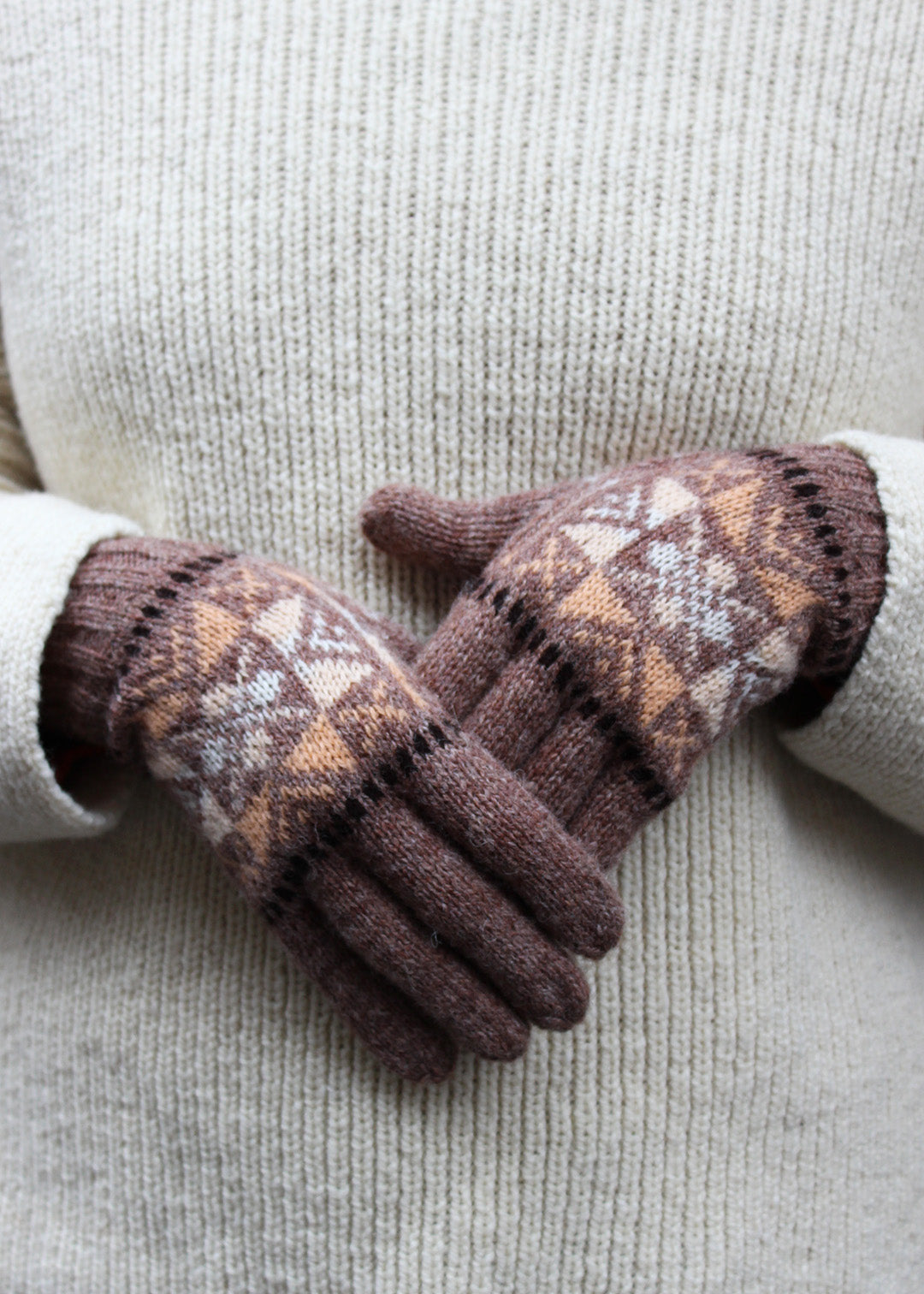 Pair of brown Fair Isle knitted gloves.