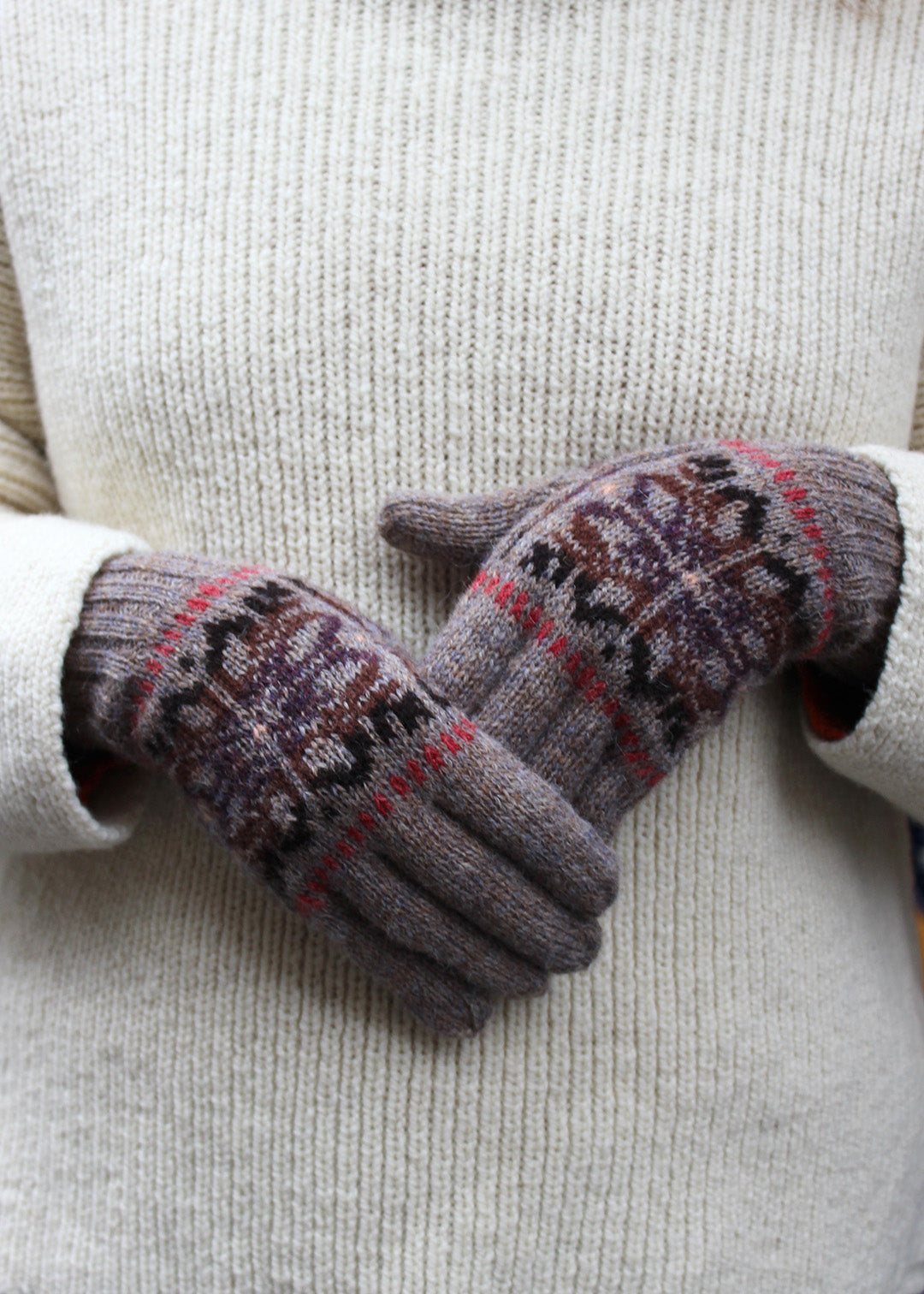 Pair of brown Fair Isle knitted gloves.
