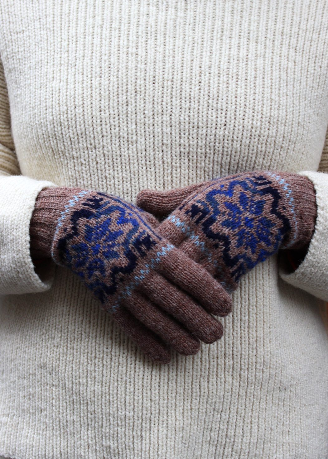 Pair of brown Fair Isle knitted gloves.