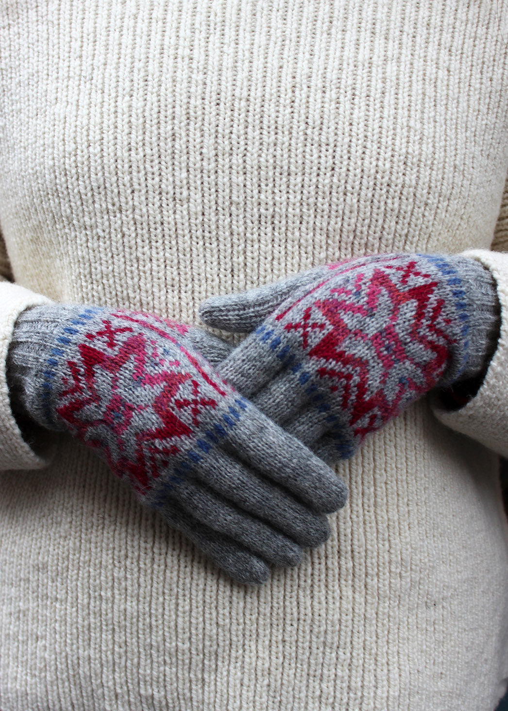 Pair of grey Fair Isle knitted gloves.