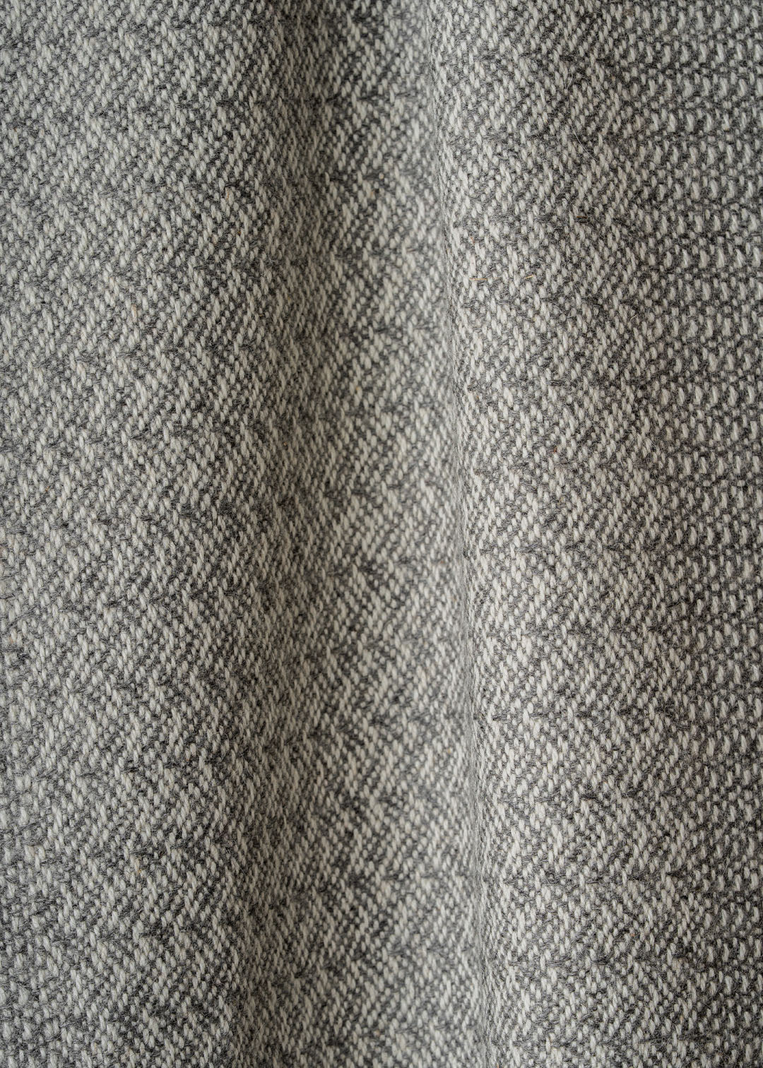 Un-dyed alpaca scarf in grey and off-white, woven in a rippling barley design.