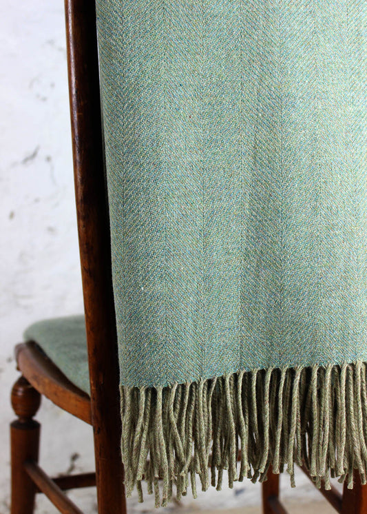 Merino throw in lichen herringbone design. Scottish Textiles Showcase. 