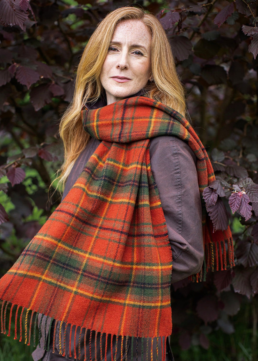 Autumn Woodland Walk tartan shawl on female model