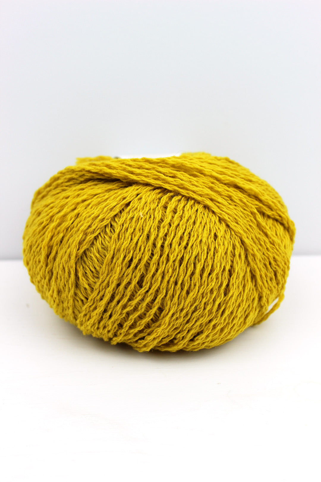 Di Gilpin yarn in yellow Furze colourway. Scottish Textiles Showcase