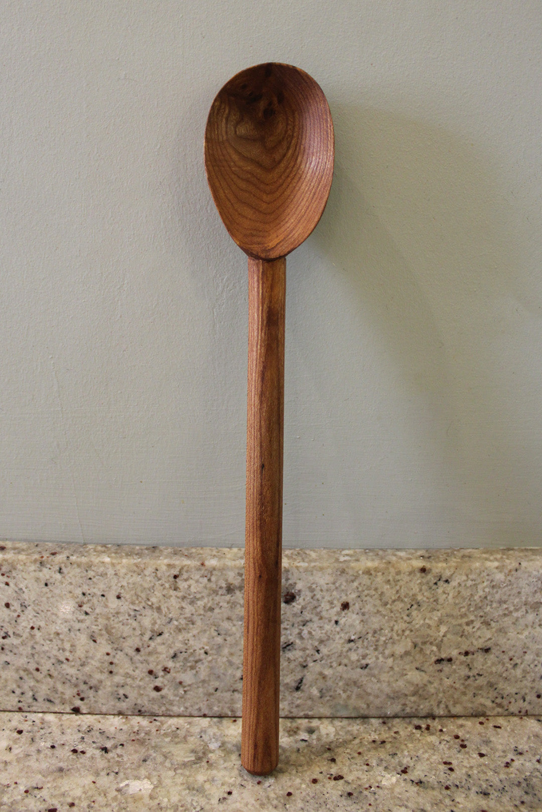 Big stirrer cooking spoon hand carved from Elm, in Fife. Scottish Textiles Showcase.