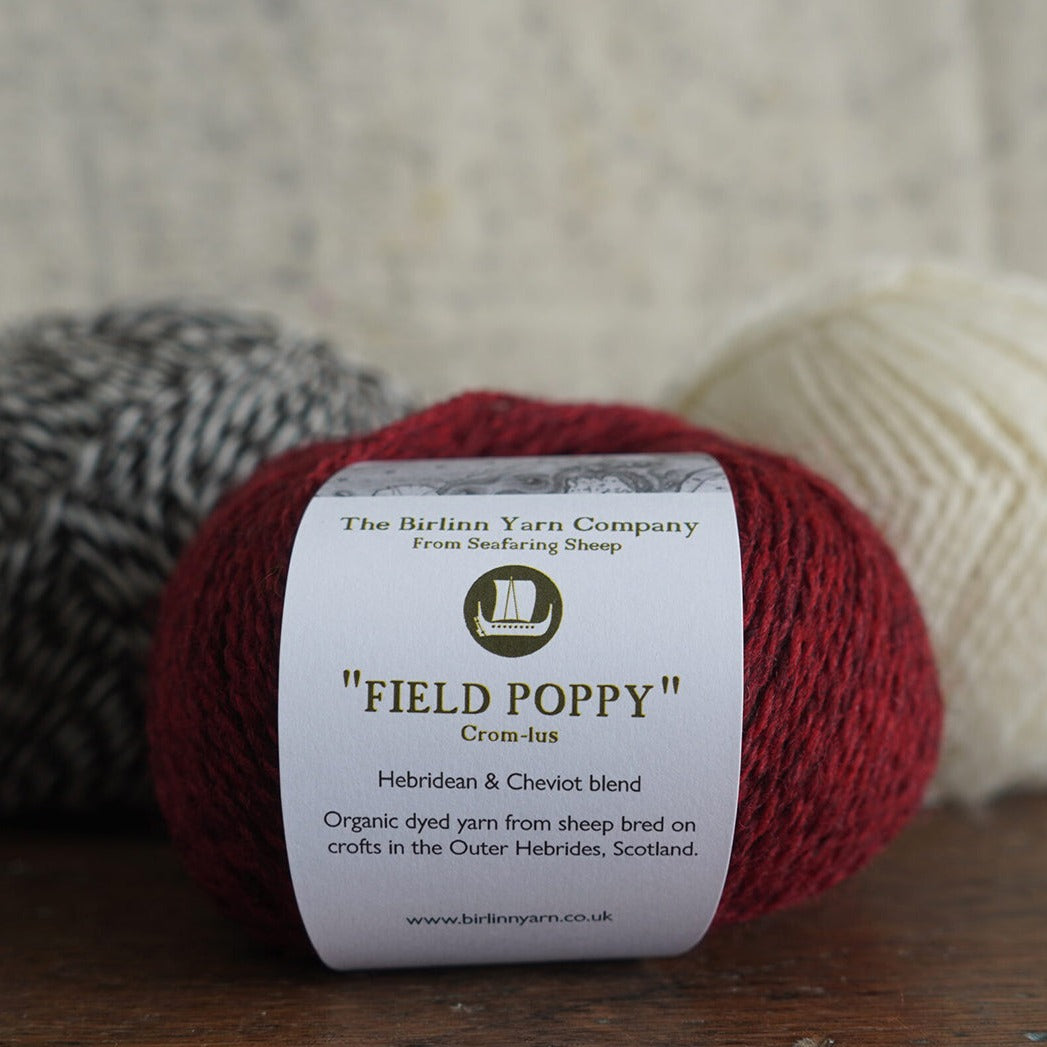 Knitting wool in shade field poppy from the outer Hebrides