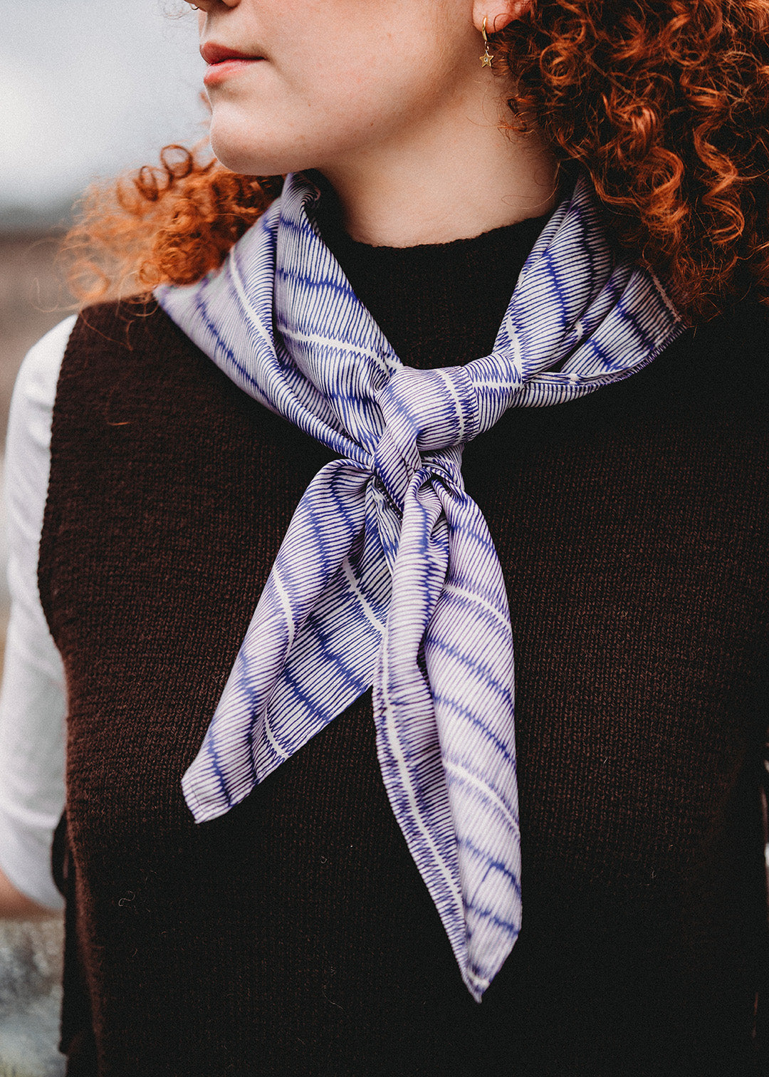 Blue and ivory large silk scarf with intricate hand-drawn print.