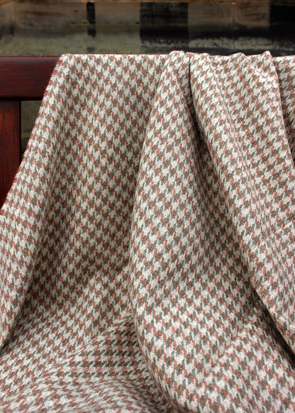 Houndstooth blanket woven in 100% British Wool, a blend of fibres from the Blue Faced Leicester sheep and Masham sheep