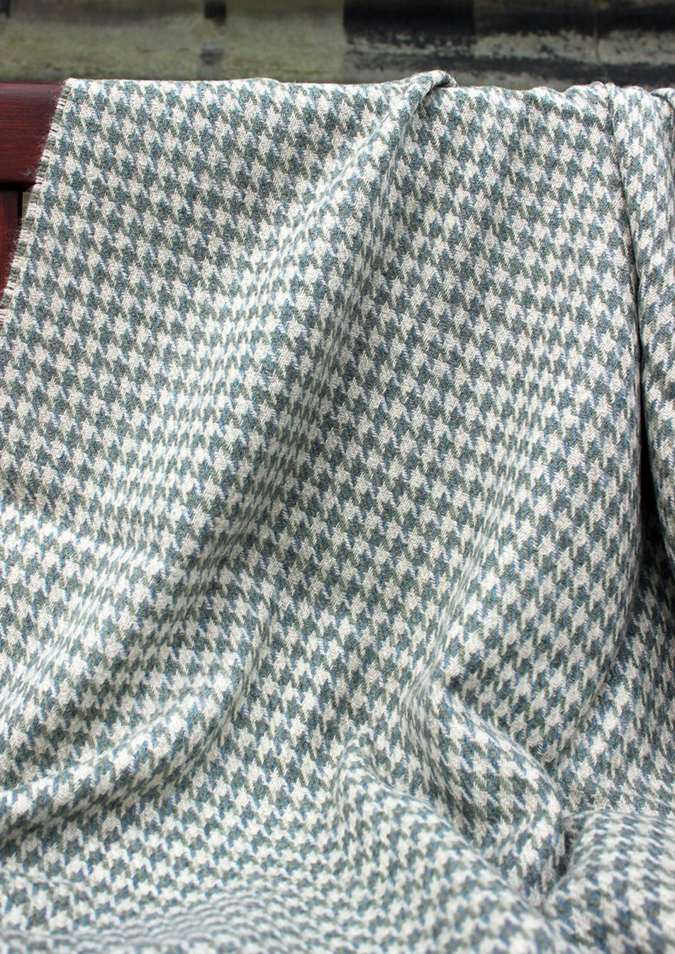 Houndstooth blanket woven in 100% British Wool, a blend of fibres from the Blue Faced Leicester sheep and Masham sheep