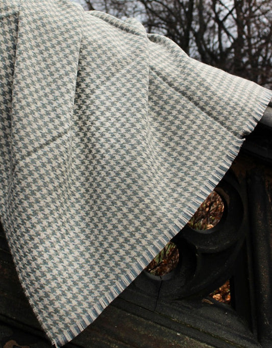 Houndstooth blanket woven in 100% British Wool, a blend of fibres from the Blue Faced Leicester sheep and Masham sheep