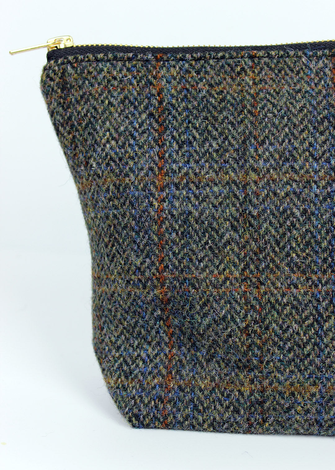 useful multi purpose bag made in store using a beautiful brown herringbone Harris Tweed with rust and blue overcheck