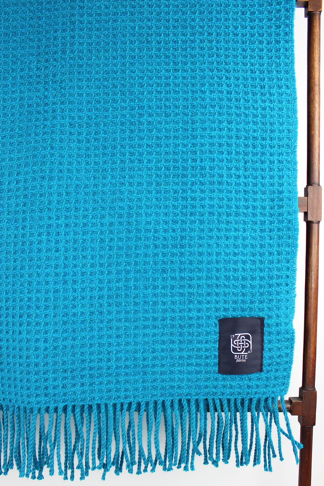 Bute waffle throw in Turquoise