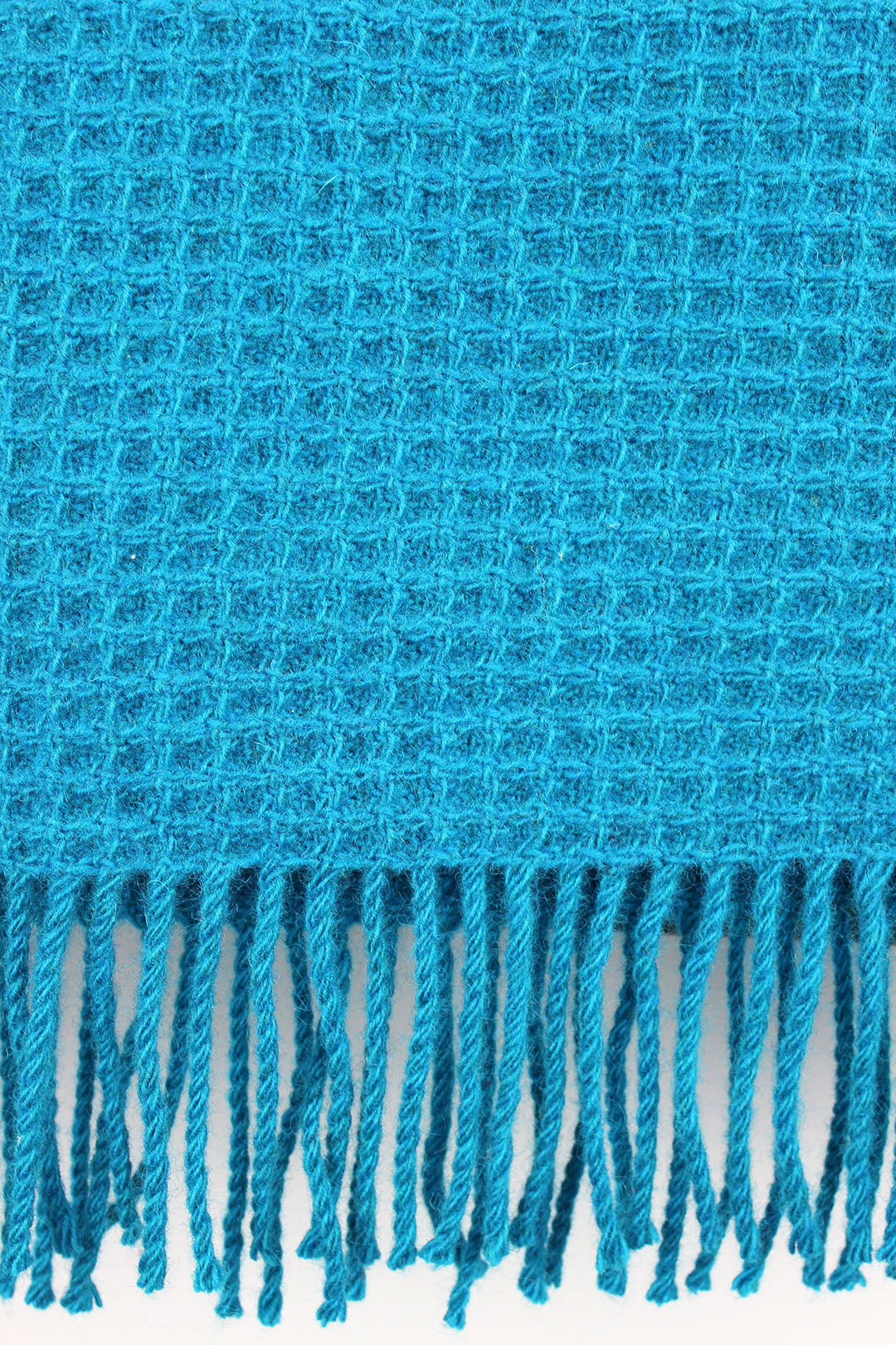 Bute waffle throw in Turquoise