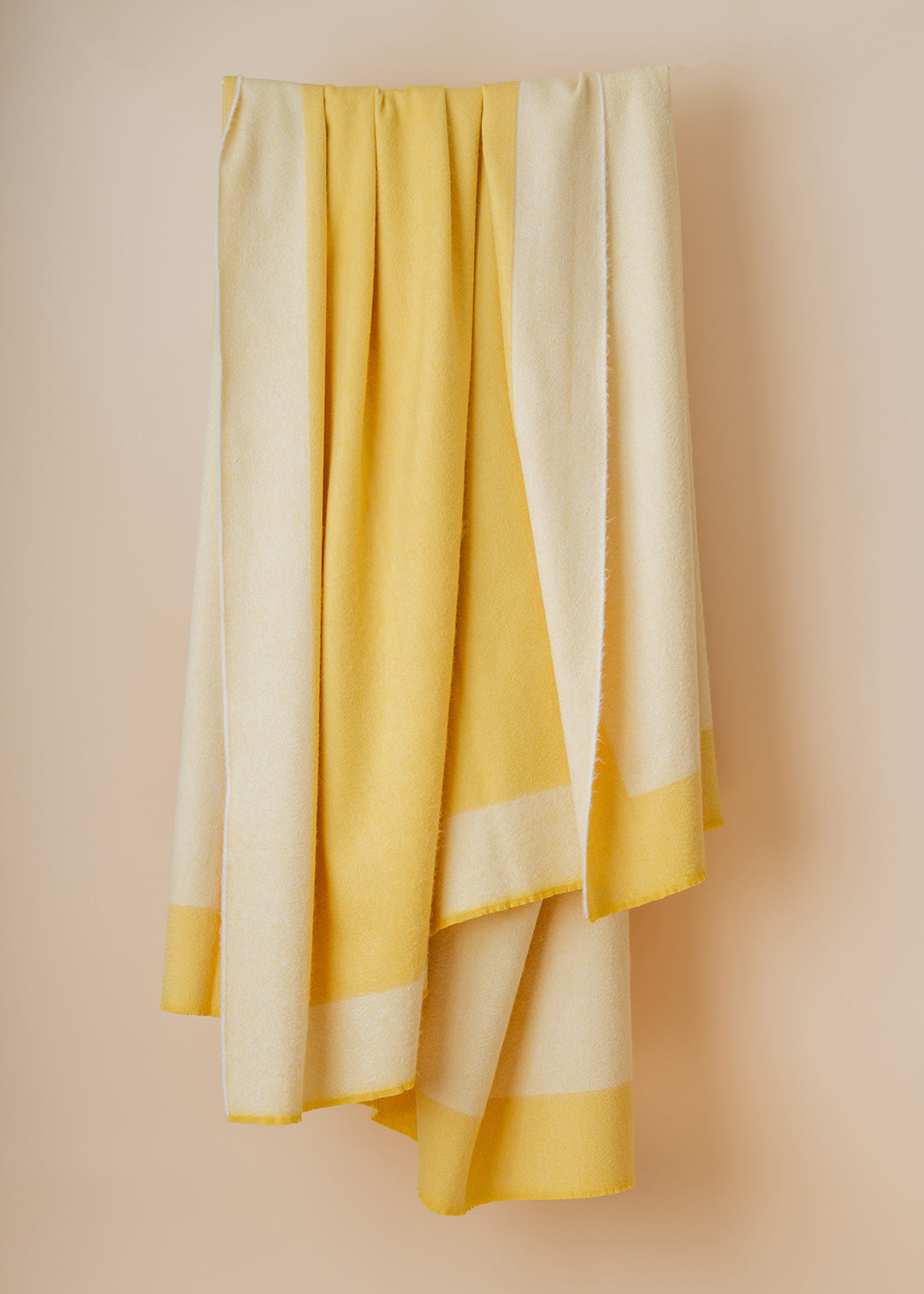 Cashmere throw in buttercup yellow.