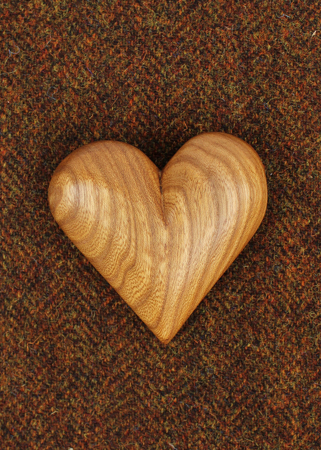 Hand carved wooden heart in Elm.